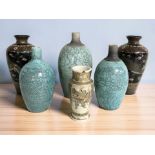 Two Japanese Meiji period cloisonne enamel vases decorated with dragons,