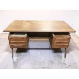 A Scandinavian teak twin pedestal desk,