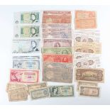 A collection of European and world banknotes, including a Bank of England five pounds note, Chief
