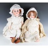 A Heubach Köppelsdorf socket bisque head doll, impressed '320.8', with later auburn wig, sleeping