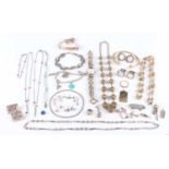 A group of mostly silver jewellery, comprising a filigree bead necklace, two further necklaces, a