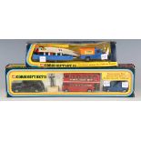 Two Corgi Gift Sets, comprising No. 11 Routemaster Bus, Morris Mini-Minor, Austin Taxi and