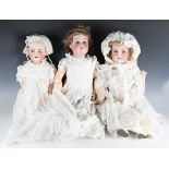 Three Simon & Halbig K&R bisque socket head dolls, comprising a baby doll, impressed '126 50',