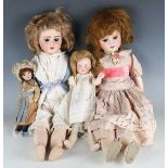 Four SFBJ bisque socket head dolls, comprising two impressed '60 3', with later wigs, sleeping brown