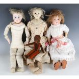 A 19th century wax-over-composition head and shoulders doll with brown glass eyes and fabric body,