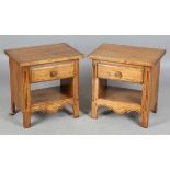A pair of late 20th century French oak bedside tables, height 51cm, width 50cm, depth 35cm.
