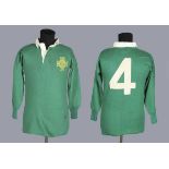 A Bill Dickson green and white No. 4 Northern Ireland match-worn shirt, bearing 'Bukta' maker's