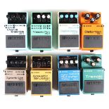A group of eight Boss guitar pedals, comprising DS-1, DD-3, PN-2, CE-5, TR-2, AW-3, AC-2 and PS-2,