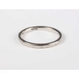 A platinum wedding ring, partial marks, weight 3.4g, ring size approx M.