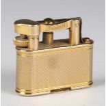 A 9ct gold Dunhill pocket lighter, Patent No. 143752, London 1928, width 3.7cm, weight 32g.