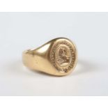 An 18ct gold oval signet ring, engraved with a crest and motto ‘Per castra ad astra’ (Through the