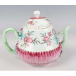 A Chinese famille rose export porcelain teapot and matched cover, Yongzheng period, the low-