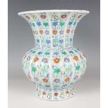 A Chinese doucai porcelain petal-lobed vase, mark of Qianlong but probably later Qing dynasty, the