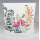 A Chinese famille rose enamelled porcelain brushpot, the exterior painted with a scene of