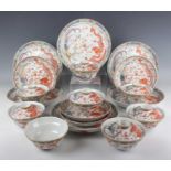 A Chinese famille rose enamelled dragon and fenghuang pattern porcelain part service, mark of