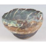 An early Ewen Henderson studio pottery bowl, circa 1975, the abstract shape formed from mixed