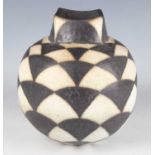 A John Ward stoneware studio pottery vase, circa 1985, the spherical body beneath a square neck,