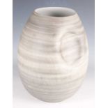 A Ligne Roset Pression biscuit porcelain vase, designed by Marcia Briha & Marta Frutuoso, painted in