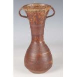 A Janet Leach St. Ives studio pottery two-handled vase, circa 1987, the pear shaped body with
