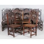 A harlequin set of ten late 17th century oak Yorkshire backstools, each with typical carved double-