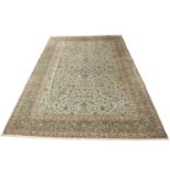 A Kashan carpet, Central Persia, late 20th century, the celadon field with a shaped medallion