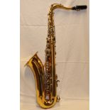 A good quality brass and silver-plated Selmer copy Saxophone by Michael White in fitted case with