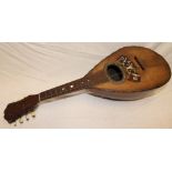 An old Italian mandolin by Giovani Montaldi in inlaid rosewood case