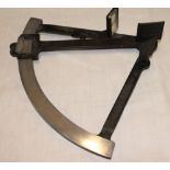 A painted aluminium sextant with curved calibrated dial
