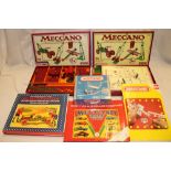 Two modern Meccano construction sets, an unopened Meccano trailer kit,