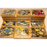 Three modern three drawer table chests containing a large selection of various modern Meccano and