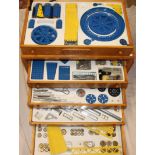 A modern wooden Meccano five drawer chest containing a selection of good quality modern Meccano