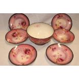A German Bonn pottery fruit set by Franz Mehlem comprising a circular pedestal fruit bowl with