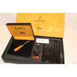 An Italian Delta collector's fountain pen set in presentation box with desk stand and ink bottle