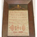 A 19th century Cornish needlework sampler depicting alphabet and numbers by Elizabeth Ann Bawden,