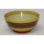 A Clarice Cliff pottery circular bowl with yellow, blue and red lined decoration,