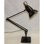 A traditional anglepoise lamp by Herbert Terry of Redditch