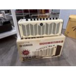 A Yamaha THR10 portable guitar amplifier, boxed with lead and manual