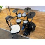 A Roland TD-9 electronic drum kit (V-Drums), with additional stands, cymbal and a Trust Urban