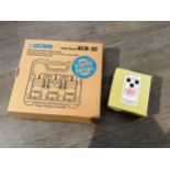 A Boss BCB-30 pedal board to hold three pedals, boxed, together with an Electro-Harmonix "Soul Food"