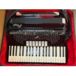 A Rivoli 120 bass model piano accordion, four sets of handmade reeds, treble with seven couplers and