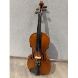 A 20th Century viola, full size, no maker visible, cased, with sheet music