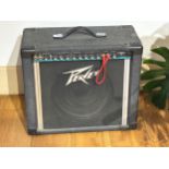 A Peavey Express 112 electric guitar amplifier