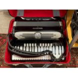 A Giulietti 120 bass model piano accordion, four sets of handmade treble reeds, treble with six