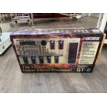 A Boss GT-6 guitar effects processor pedal, boxed