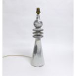 A Modernist reformed resin/crete table lamp base of conical form with three 'rings'. White and