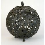 A bronze Japanese spherical openwork lantern decorated with bamboo leaves, converted to hold a light