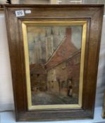 An oil on board street scene with cathedral backdrop marked possibly Gunning 05