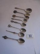 Seven silver spoons including souvenir examples, and 1 silver plate total weight 95 grams