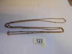 A long 9ct gold chain, approximately 60