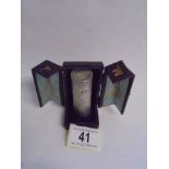 A scent bottle made from Victorian silver shillings in original case (case a/f and no stopper).